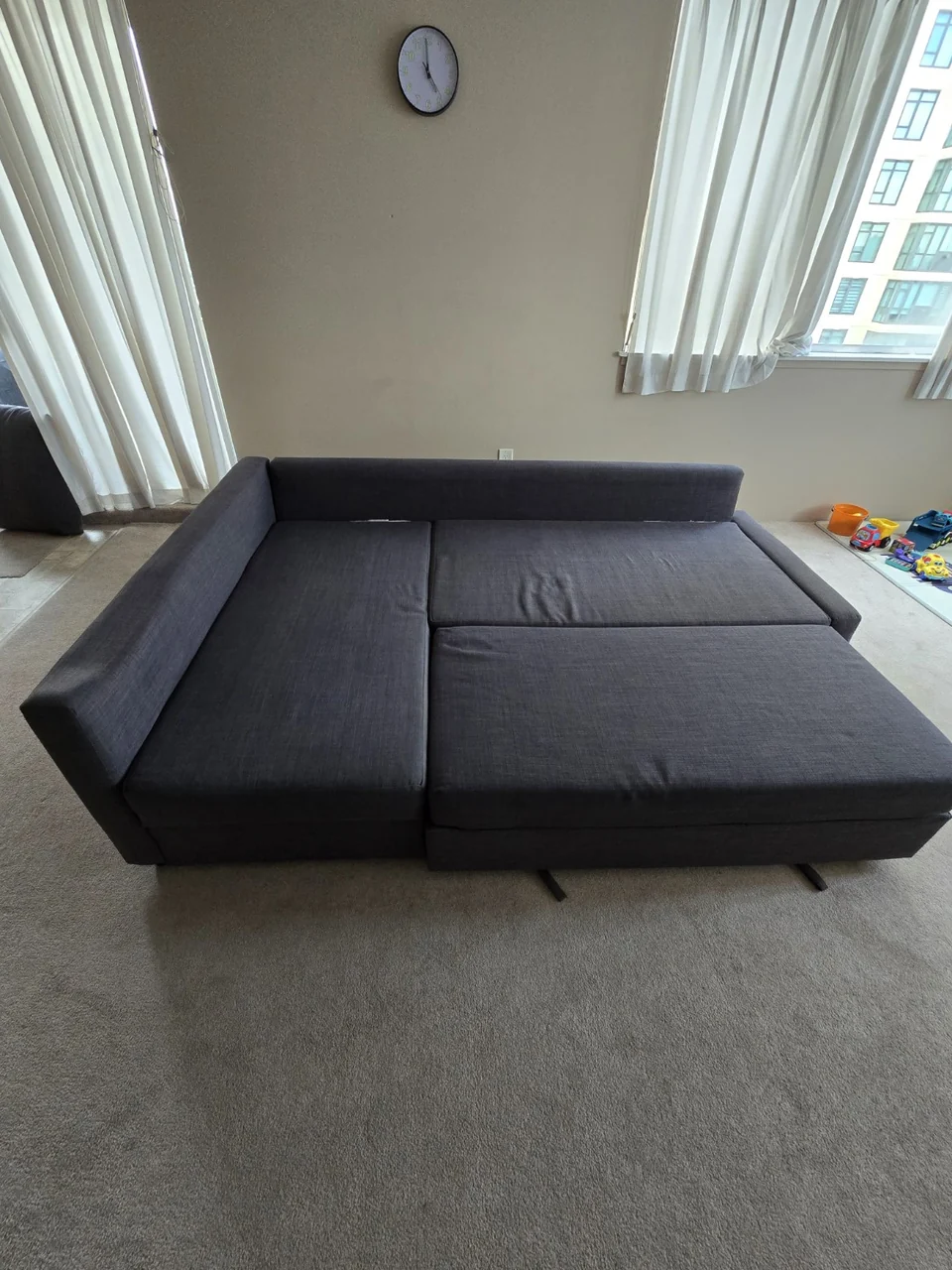 Dark grey sectional sofa after upholstery cleaning — PureFresh Cleaning, serving Port Moody, BC